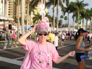 Tracie Biery, a survivor, of team "Life is Good" walks proudly with the 1st place plunger on her head - for best decorated Tickled Pink Potty.