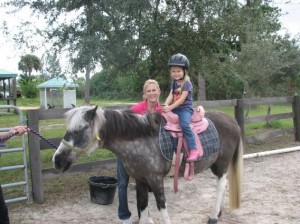 Shawn Thompson with her daughter at The Good Earth Farm.